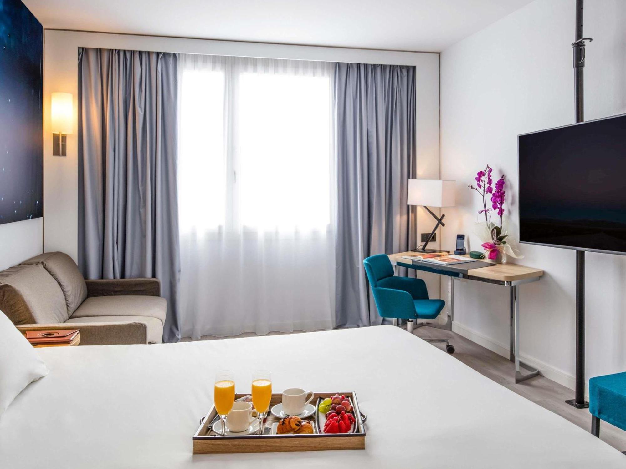 Habitación Executive con cama doble y sofá